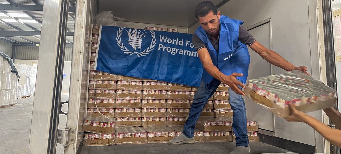 A worker unloads ready-to-eat rations from a truck close to Alexandria, Egypt, in preparation for delivery to Gaza. A worker unloads ready-to-eat rations from a truck close to Alexandria, Egypt, in preparation for delivery to Gaza.